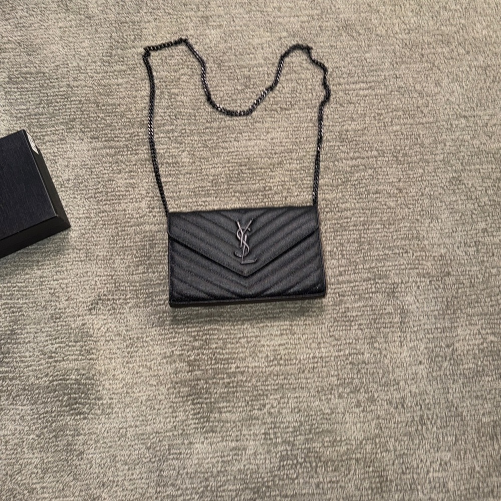 Yves Saint Laurent Black Chevron Clutch. Unsure about authenticity